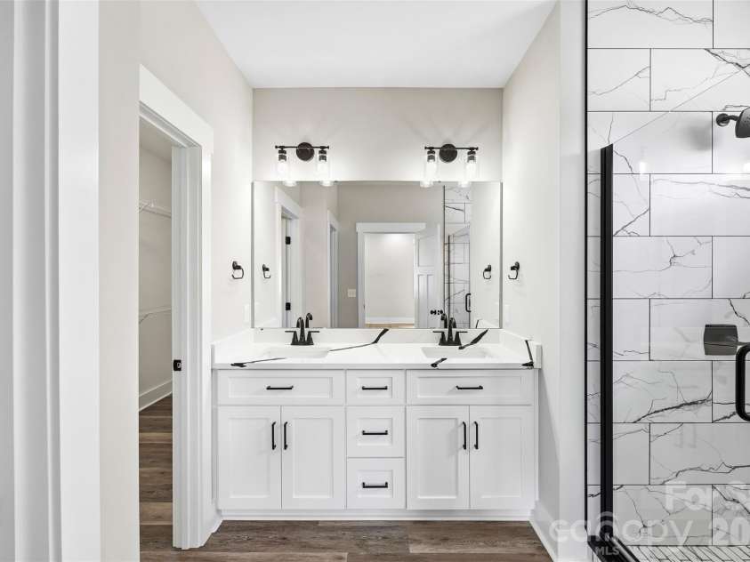 1008 Speight Road, Albemarle, NC 28001.  MLS# CAR4377011, YatesRealty ID 22352. Primary Double Sink Vanity