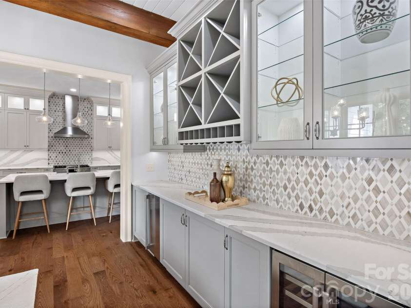 2135 Sharon Avenue, Charlotte, NC 28211.  MLS# CAR4414349, YatesRealty ID 22356. Bar with Additional Storage