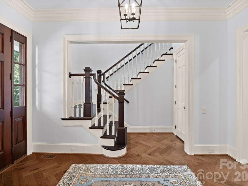 2135 Sharon Avenue, Charlotte, NC 28211.  MLS# CAR4414349, YatesRealty ID 22356. Beautiful Staircase