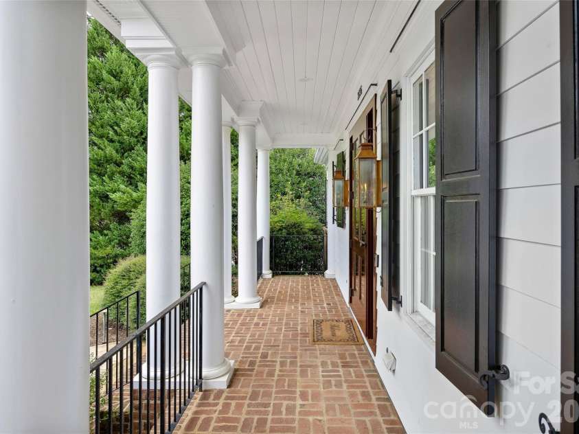 2135 Sharon Avenue, Charlotte, NC 28211.  MLS# CAR4414349, YatesRealty ID 22356. Expansive Front Porch
