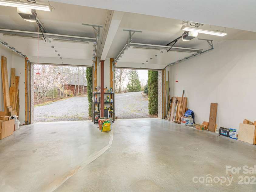 526 Grand Oaks Drive, Hendersonville, NC 28792.  MLS# CAR4239687, YatesRealty ID 22359. 11 ft ceilings in 2 Bays & 3rd Bay in Next Picture w/Workshop!
