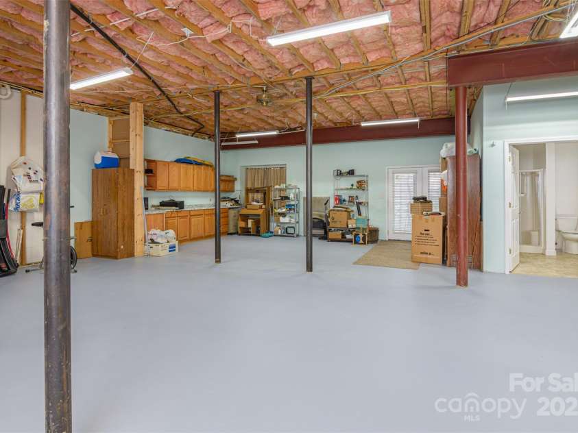 526 Grand Oaks Drive, Hendersonville, NC 28792.  MLS# CAR4239687, YatesRealty ID 22359. Basement w/11 ft ceilings & Full Bath.  TONS of Storage.  COULD BE FULLY FINISHED