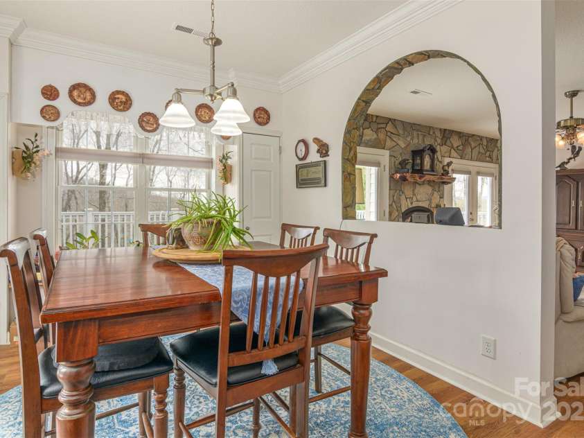 526 Grand Oaks Drive, Hendersonville, NC 28792.  MLS# CAR4239687, YatesRealty ID 22359. Beautiful and well lit Breakfast/Dining Room