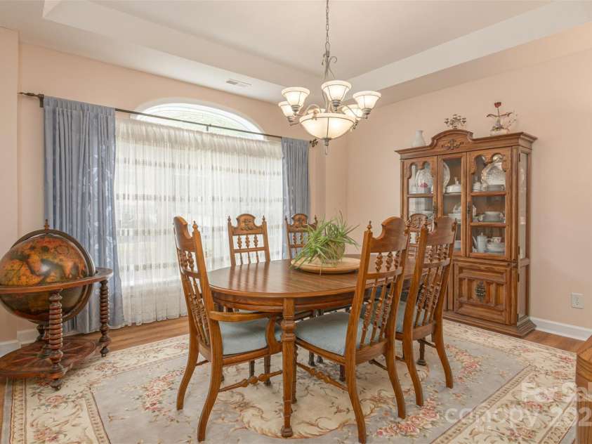 526 Grand Oaks Drive, Hendersonville, NC 28792.  MLS# CAR4239687, YatesRealty ID 22359. Formal Dining Room, Or the Perfect in Home Office w/High Speed Internet!