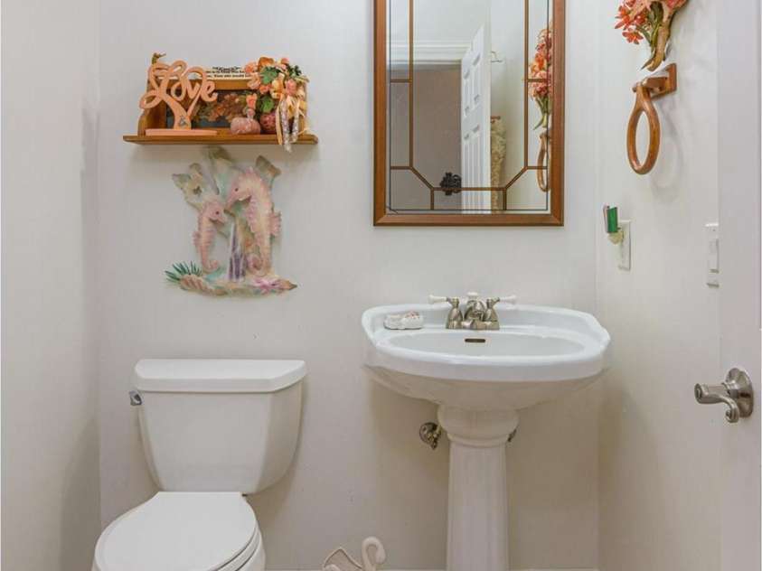 526 Grand Oaks Drive, Hendersonville, NC 28792.  MLS# CAR4239687, YatesRealty ID 22359. Large Half bath off Great room on main floor