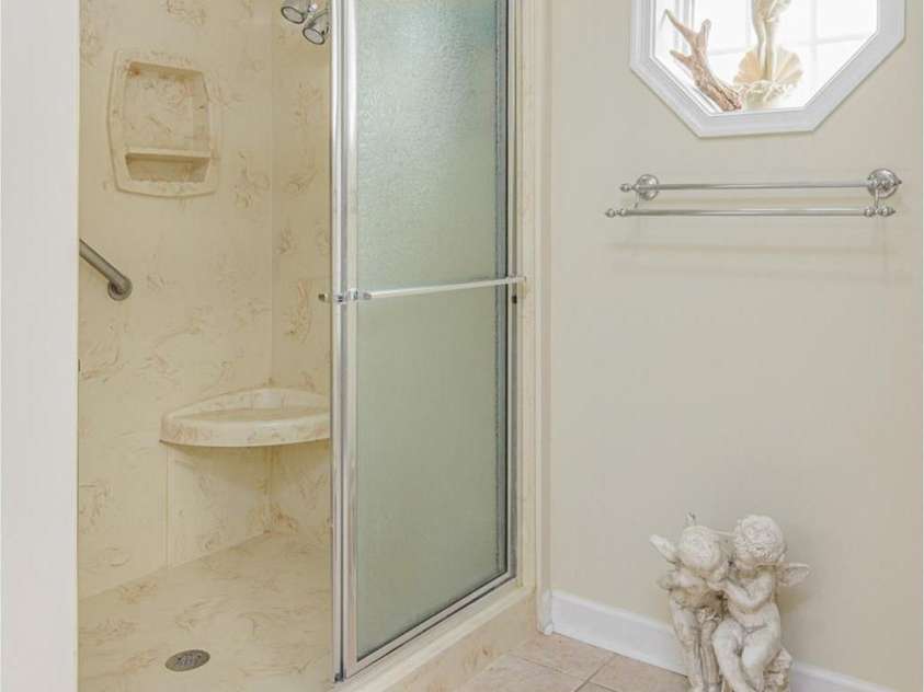 526 Grand Oaks Drive, Hendersonville, NC 28792.  MLS# CAR4239687, YatesRealty ID 22359. Large Walk-In Shower