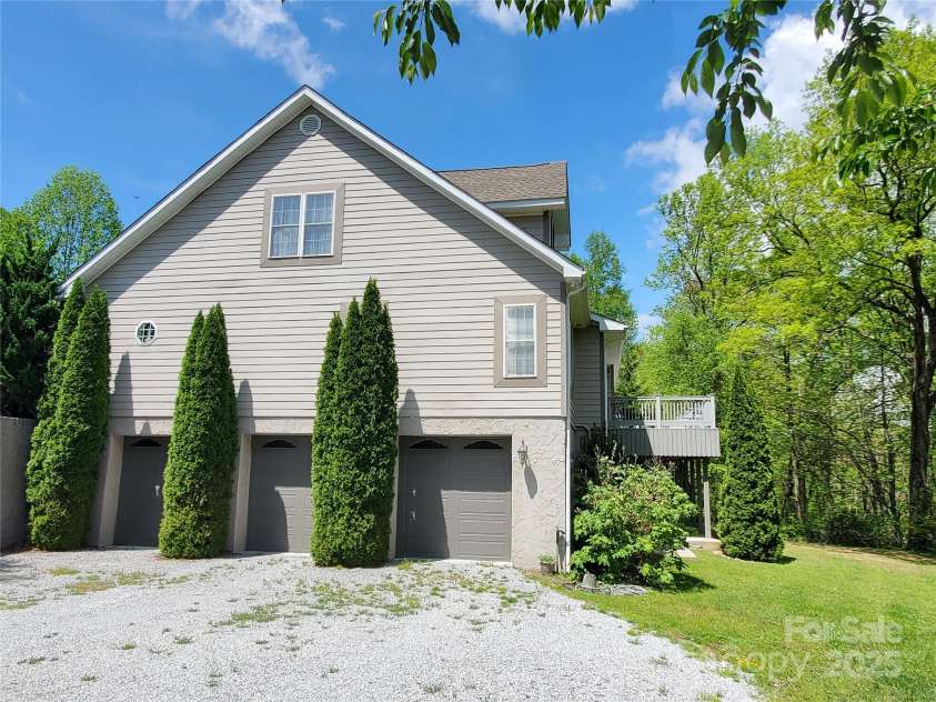 526 Grand Oaks Drive, Hendersonville, NC 28792.  MLS# CAR4239687, YatesRealty ID 22359. LG Workshop & 2 Car Garage.