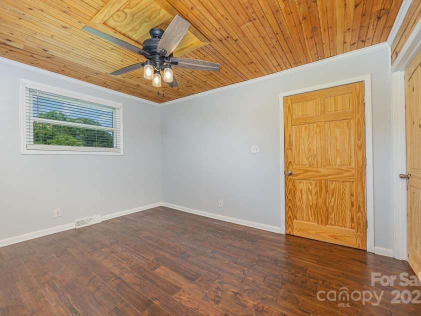 164 Dogtrot Road, Mocksville, NC 27028.  MLS# CAR4275149, YatesRealty ID 22366. Primary Bedroom