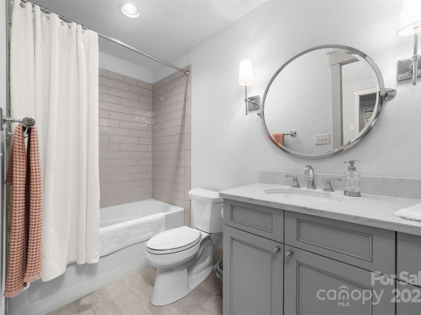 68 Cinch Knot Drive, Nebo, NC 28761.  MLS# CAR4233155, YatesRealty ID 22370. En-suite guest bath.