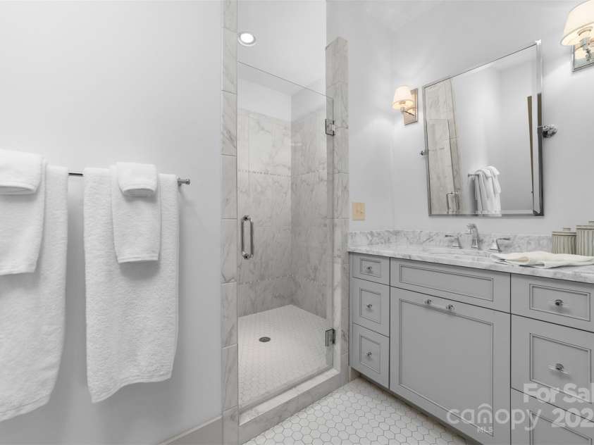 68 Cinch Knot Drive, Nebo, NC 28761.  MLS# CAR4233155, YatesRealty ID 22370. En-suite guest bath.