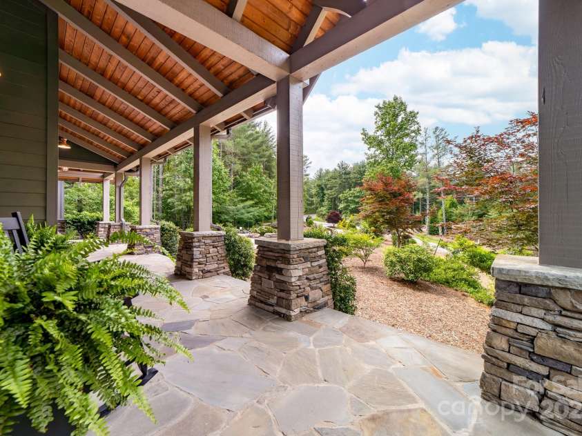 68 Cinch Knot Drive, Nebo, NC 28761.  MLS# CAR4233155, YatesRealty ID 22370. Flagstone front porch greats you as you enter.