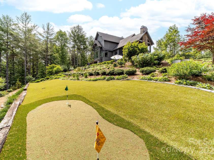 68 Cinch Knot Drive, Nebo, NC 28761.  MLS# CAR4233155, YatesRealty ID 22370. Fully fenced back yard with your own mini putting green!