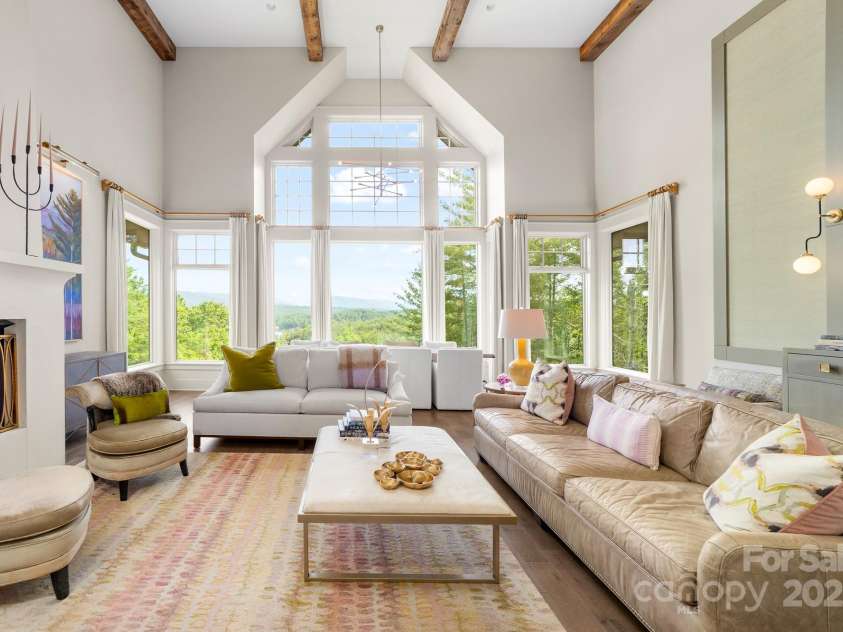 68 Cinch Knot Drive, Nebo, NC 28761.  MLS# CAR4233155, YatesRealty ID 22370. It is rare that a NC home has both lake and mountain views. Plus, a casually elegant home to enjoy.