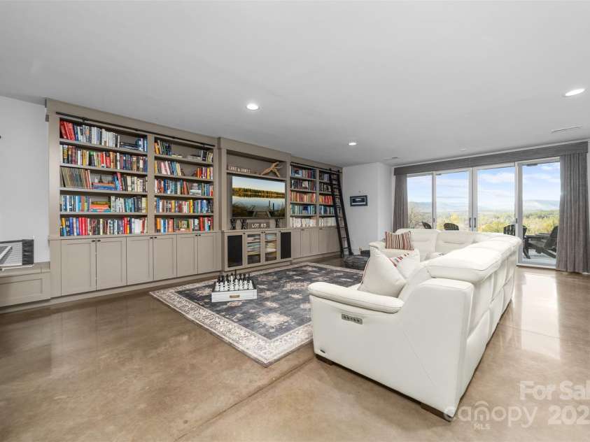 68 Cinch Knot Drive, Nebo, NC 28761.  MLS# CAR4233155, YatesRealty ID 22370. Lower level game room offers a custom built bookcase/entertainment center and look at the views!