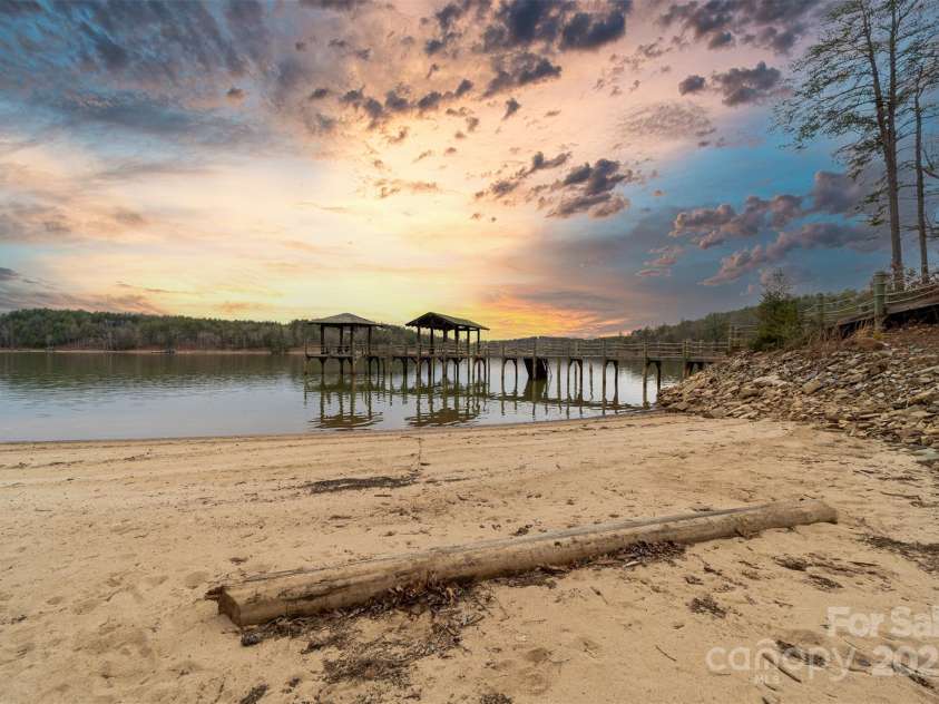 68 Cinch Knot Drive, Nebo, NC 28761.  MLS# CAR4233155, YatesRealty ID 22370. Perfect lake-side beach at Camp Lake James.