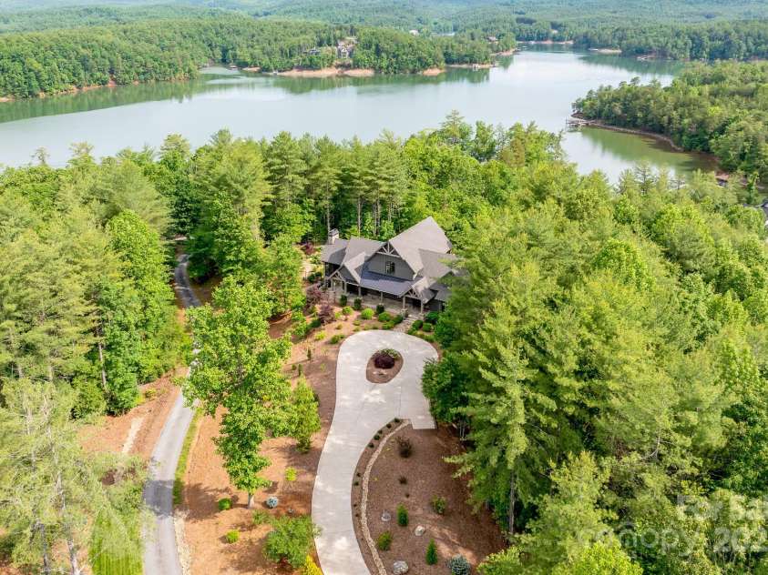 68 Cinch Knot Drive, Nebo, NC 28761.  MLS# CAR4233155, YatesRealty ID 22370. This spectacular home sits in The Old Wildlife Club located in a quiet cove on beautiful Lake James.