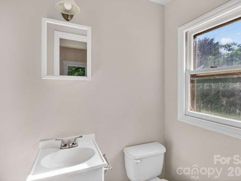 1121 Lundix Street, Albemarle, NC 28001.  MLS# CAR4381009, YatesRealty ID 22372. Half Bath