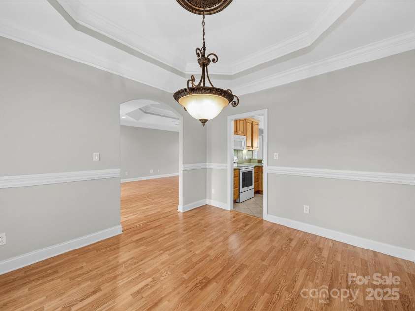 514 Clover Leaf Road, Marshville, NC 28103.  MLS# CAR4247739, YatesRealty ID 22377. Dining room according to the floor plan but could easily be used for anything, like a playroom! Smooth transition into the living room and kitchen.