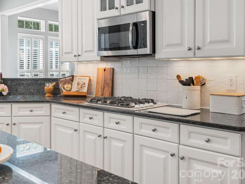 1020 Butterburr Drive, Matthews, NC 28104.  MLS# CAR4377677, YatesRealty ID 22378. Clean Classic Style