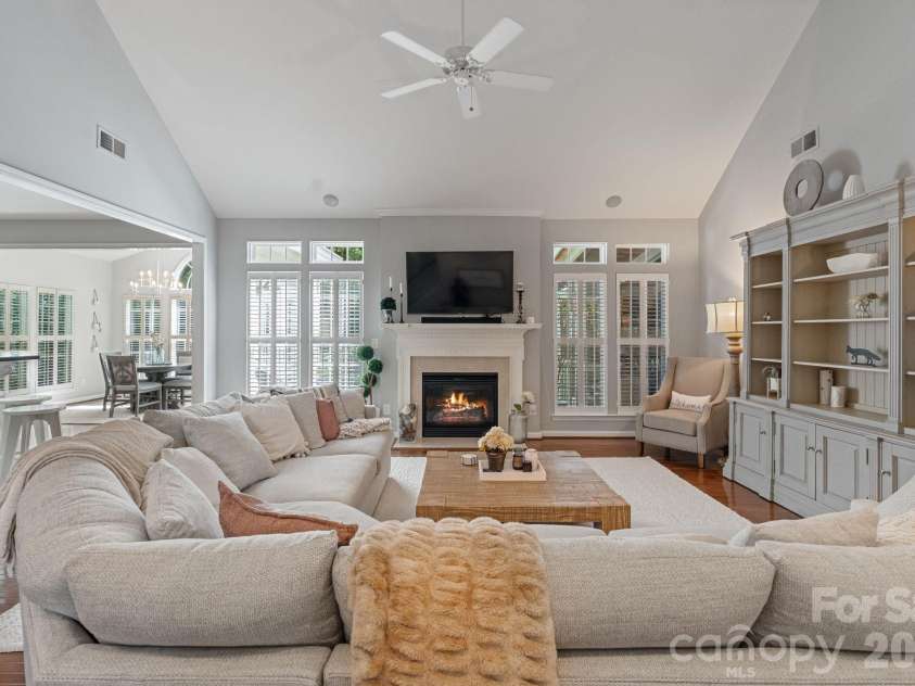 1020 Butterburr Drive, Matthews, NC 28104.  MLS# CAR4377677, YatesRealty ID 22378. Fireplace Flanked with Windows
