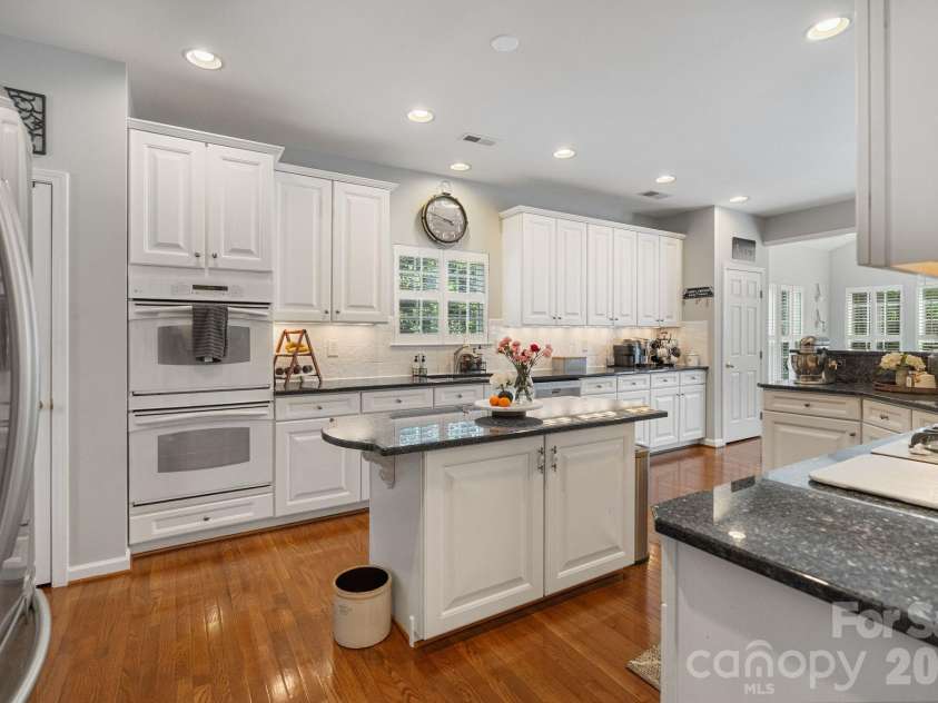 1020 Butterburr Drive, Matthews, NC 28104.  MLS# CAR4377677, YatesRealty ID 22378. White Kitchen Cabinets