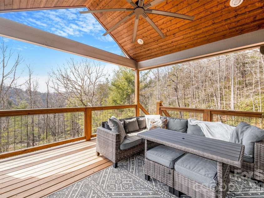 54 Weldon Way, Fairview, NC 28730.  MLS# CAR4353772, YatesRealty ID 22380. Enjoy time outdoors on the large covered deck. 
