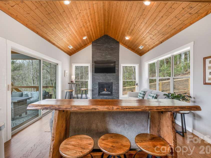 54 Weldon Way, Fairview, NC 28730.  MLS# CAR4353772, YatesRealty ID 22380. Natural wood elements compliment the natural surroundings. 