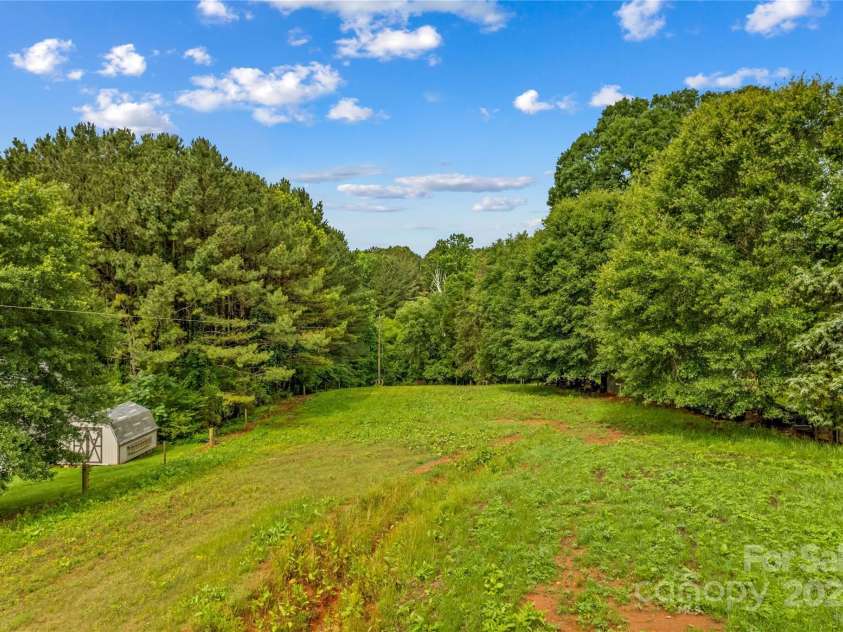 296 Hicks Creek Road, Troutman, NC 28166.  MLS# CAR4266143, YatesRealty ID 22382. Fenced Pasture