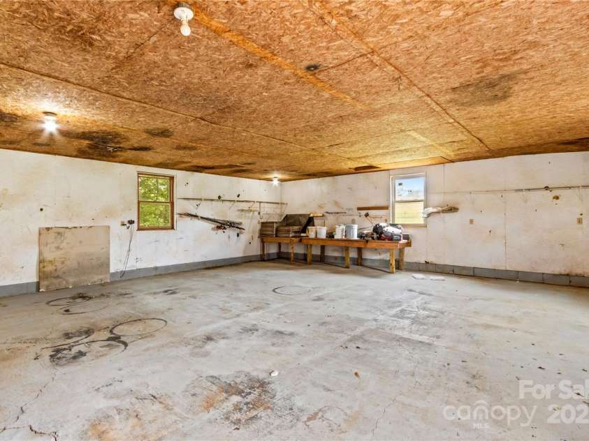 296 Hicks Creek Road, Troutman, NC 28166.  MLS# CAR4266143, YatesRealty ID 22382. Interior view of Workshop Garage