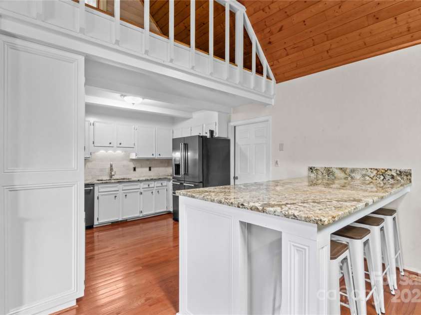 296 Hicks Creek Road, Troutman, NC 28166.  MLS# CAR4266143, YatesRealty ID 22382. Kitchen Island with Granite Countertops