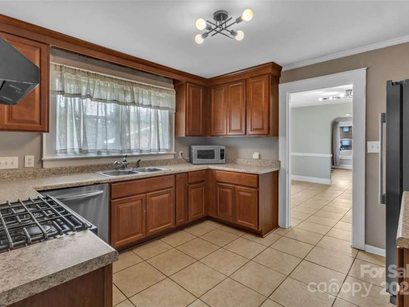 111 Church Street, Stanley, NC 28164.  MLS# CAR4260596, YatesRealty ID 22388. Kitchen with like-new appliances