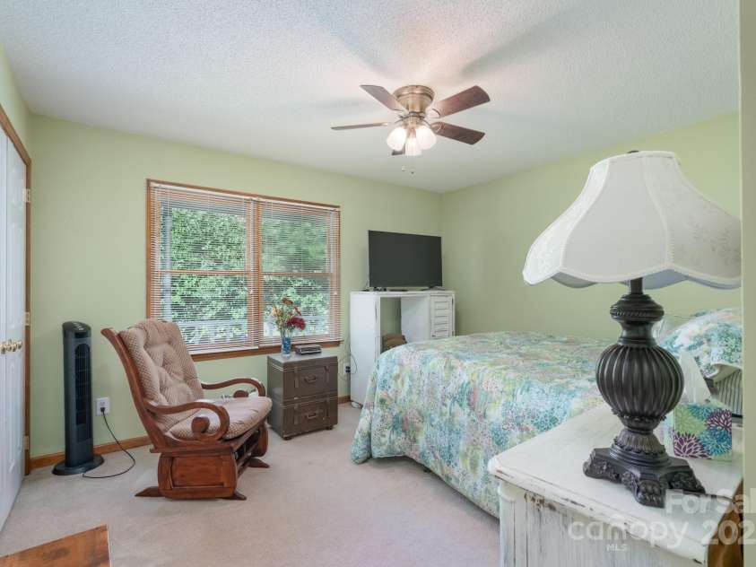 5211 Spring Glen, York, SC 29745.  MLS# CAR4270474, YatesRealty ID 22392. Bedroom # 2 with soothing paint color, ceiling fan, carpet and nice windows