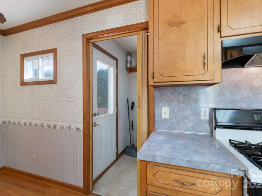5211 Spring Glen, York, SC 29745.  MLS# CAR4270474, YatesRealty ID 22392. From your kitchen/breakfast room area leading to your spacious laundry room and back door to the deck