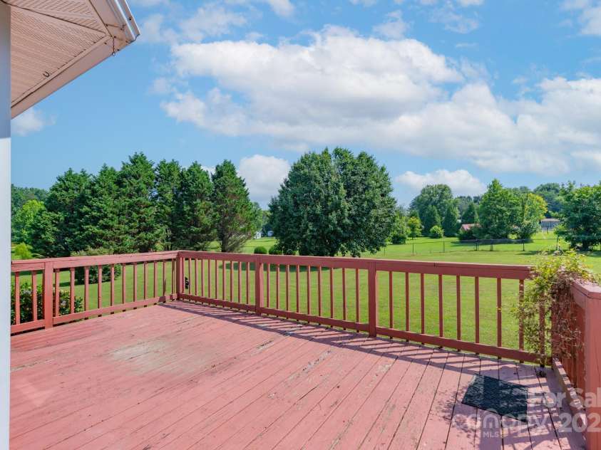 5211 Spring Glen, York, SC 29745.  MLS# CAR4270474, YatesRealty ID 22392. Full view of the large back porch overlooking the private backyard