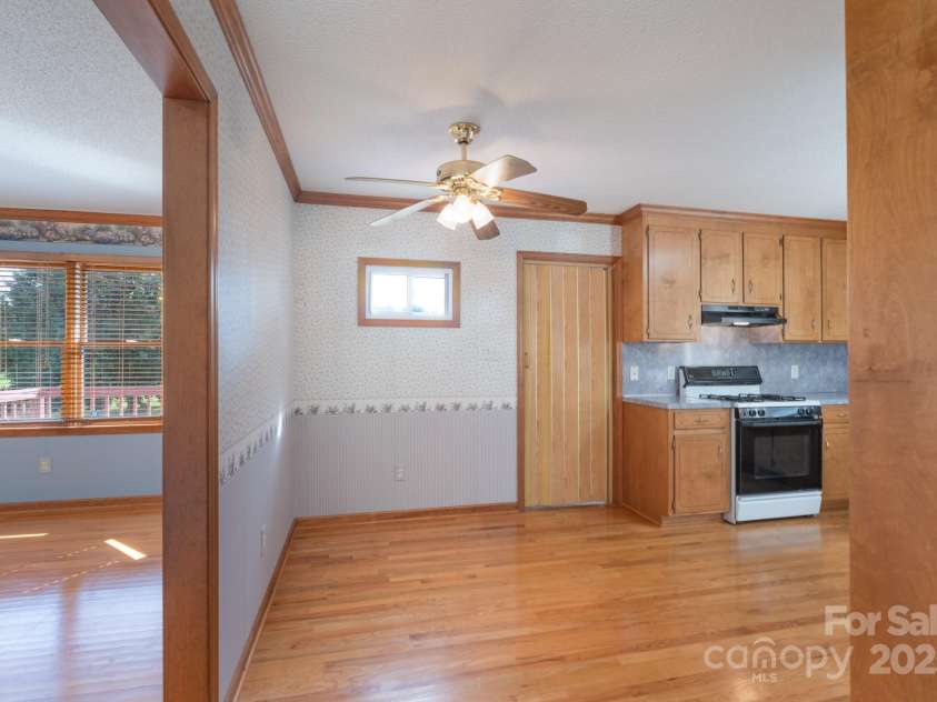 5211 Spring Glen, York, SC 29745.  MLS# CAR4270474, YatesRealty ID 22392. Kitchen breakfast room area with gleaming hardwoods