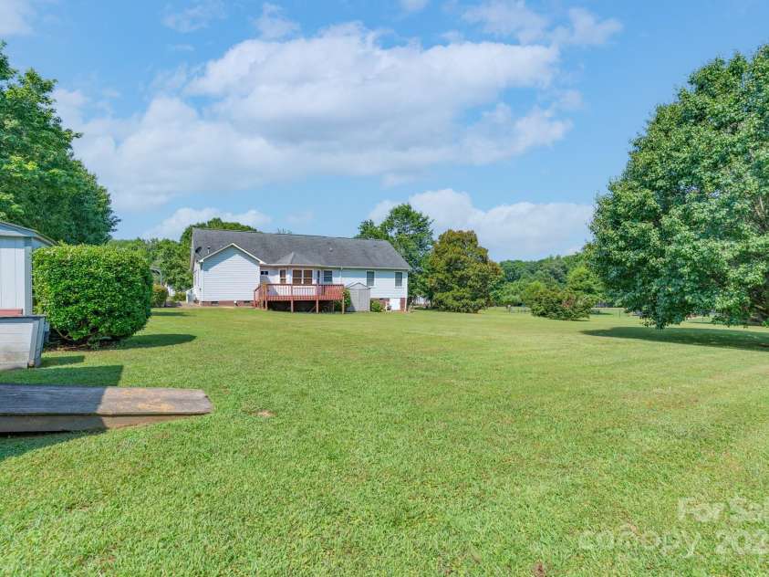 5211 Spring Glen, York, SC 29745.  MLS# CAR4270474, YatesRealty ID 22392. The backyard is amazing!  Plenty of room for a play gym, garden or a POOL!