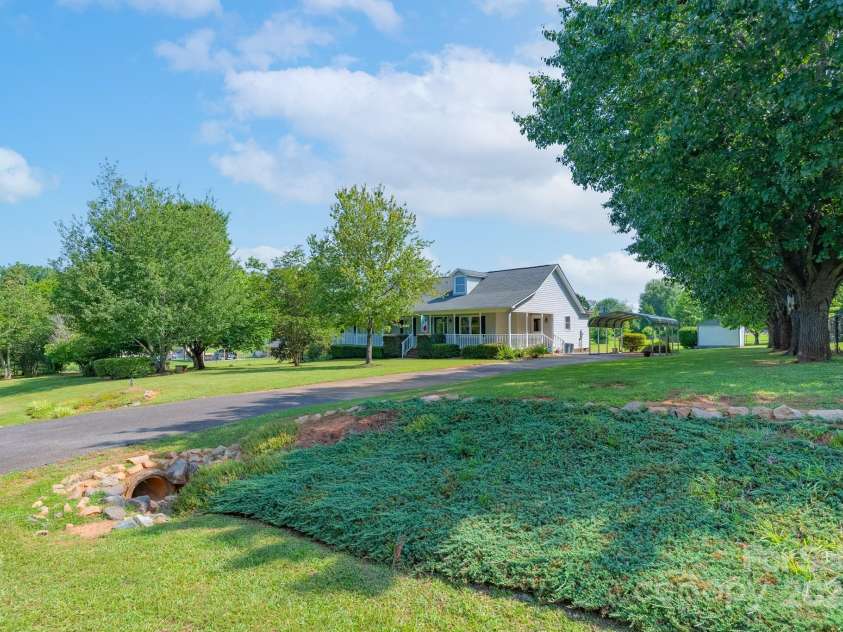 5211 Spring Glen, York, SC 29745.  MLS# CAR4270474, YatesRealty ID 22392. Tranquil setting with view of the large lot and established trees and shrubbery