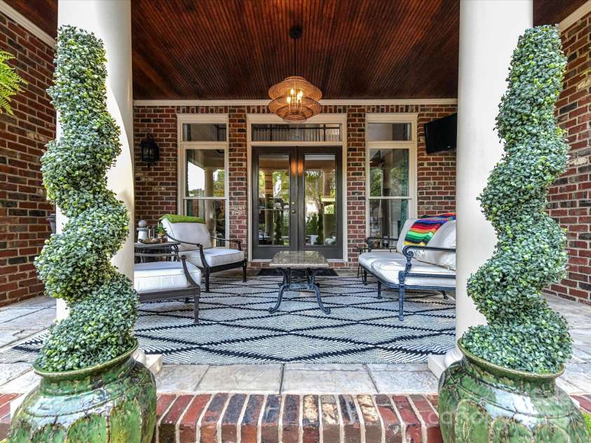 15009 Fanning Manor Court, Charlotte, NC 28277.  MLS# CAR4272630, YatesRealty ID 22393. Covered porch- perched to enjoy all the outdoor amenities.