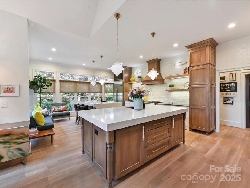 15009 Fanning Manor Court, Charlotte, NC 28277.  MLS# CAR4272630, YatesRealty ID 22393. Fabulous Dual islands in two-toned cabinetry and amazing storage.