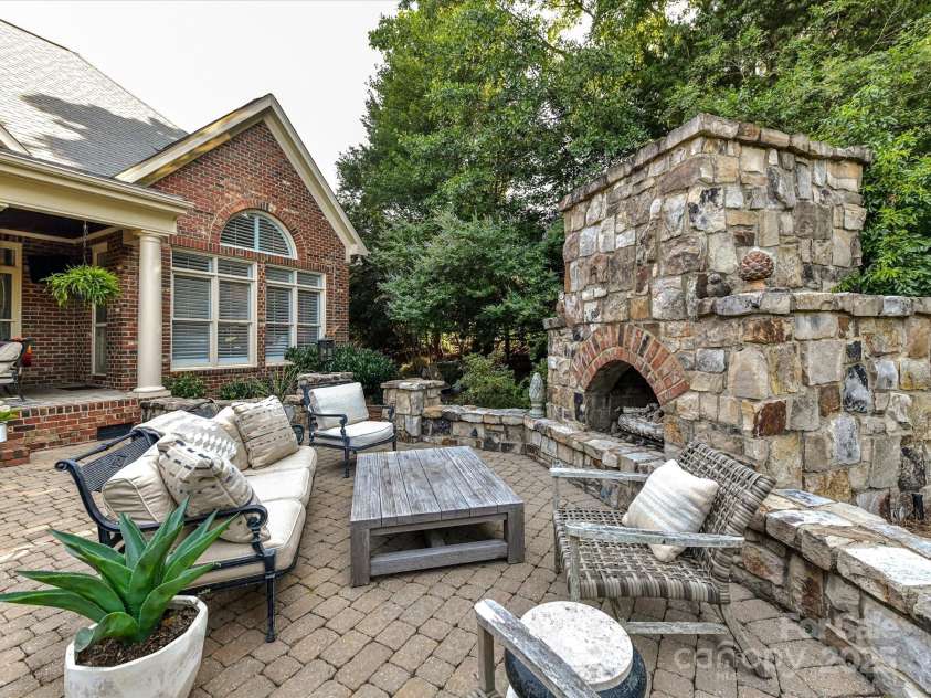 15009 Fanning Manor Court, Charlotte, NC 28277.  MLS# CAR4272630, YatesRealty ID 22393. Freestanding stone Fireplace