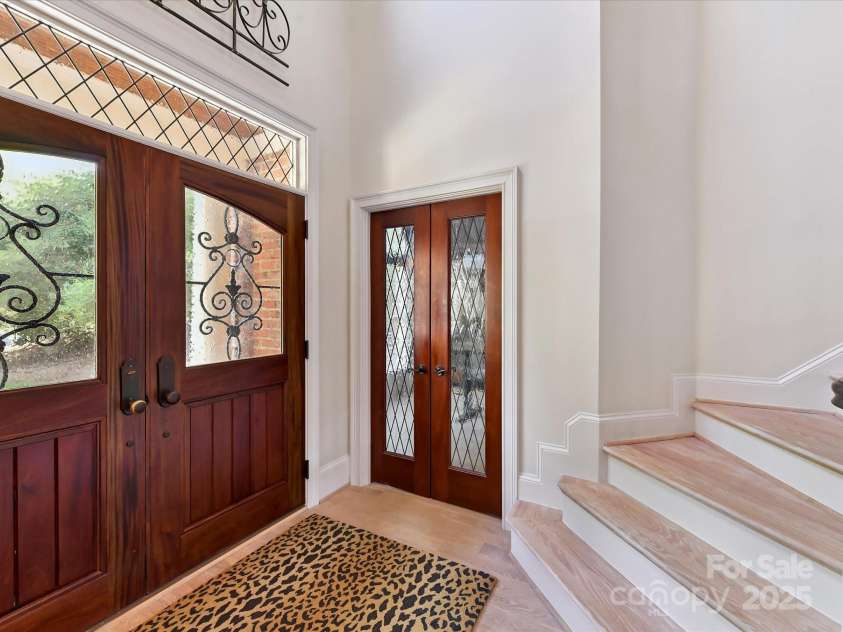 15009 Fanning Manor Court, Charlotte, NC 28277.  MLS# CAR4272630, YatesRealty ID 22393. Glass custom French doors to enter the office.
