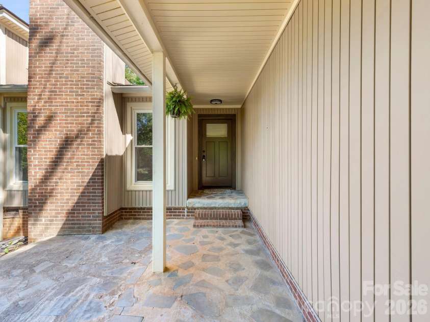 56 Knoll Ridge Drive, Asheville, NC 28804.  MLS# CAR4382409, YatesRealty ID 22395. Front patio entry, one-step entry.