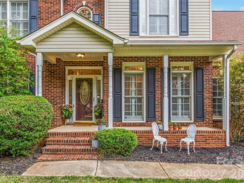 1305 Mill Race Lane, Matthews, NC 28104.  MLS# CAR4379571, YatesRealty ID 22399. Covered front porch