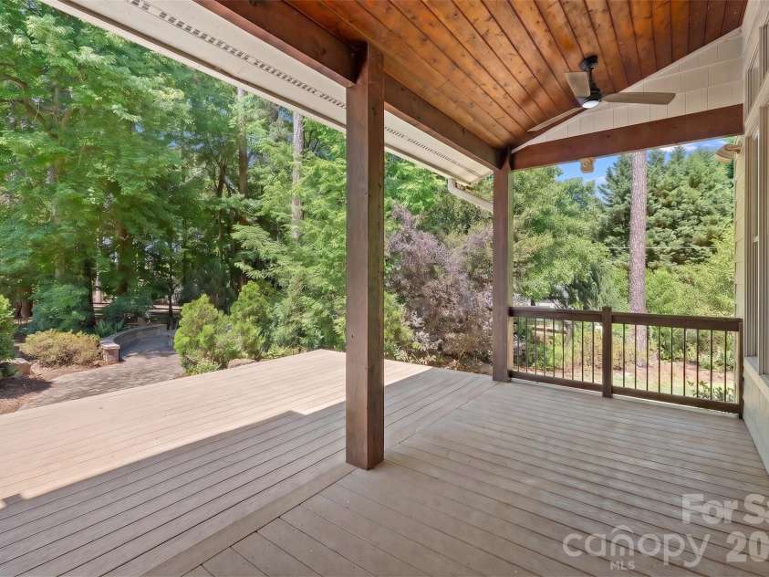 236 Tuskarora Trail, Mooresville, NC 28117.  MLS# CAR4370396, YatesRealty ID 22403. Extended Back Deck, furniture removed virtually