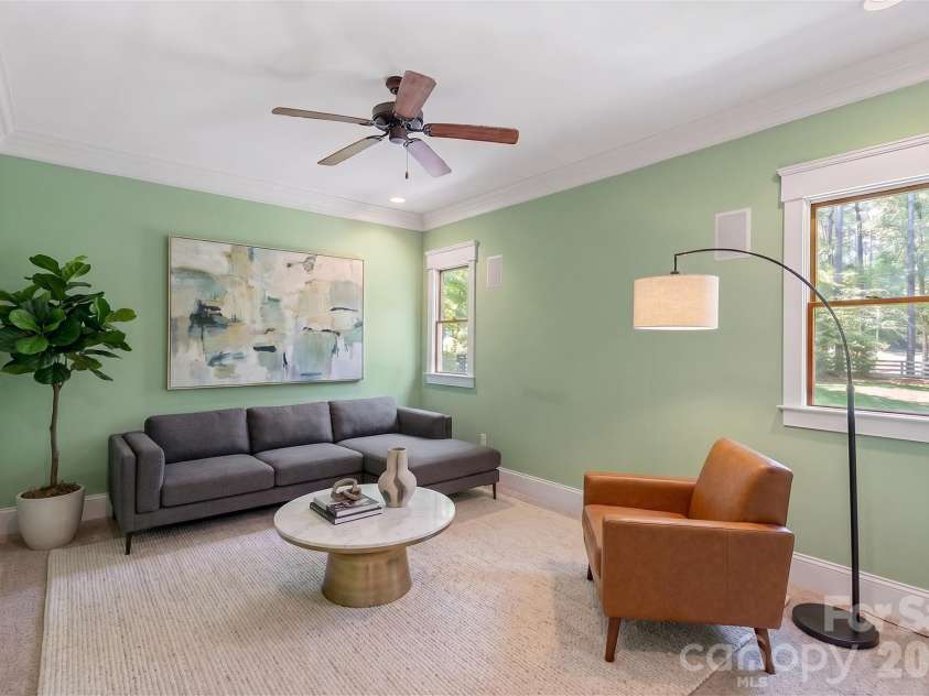 236 Tuskarora Trail, Mooresville, NC 28117.  MLS# CAR4370396, YatesRealty ID 22403. Virtually staged main level den