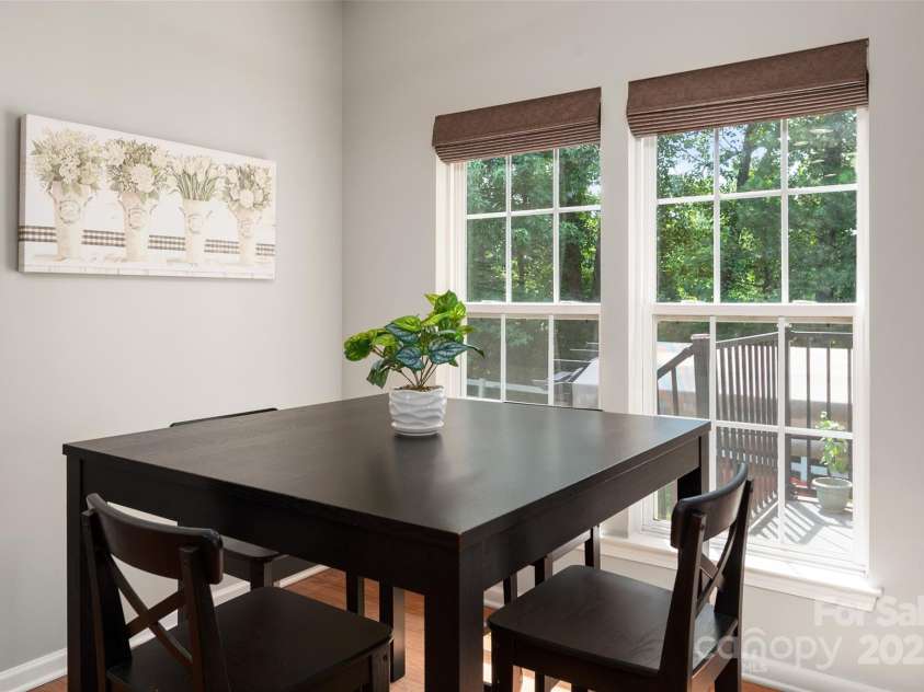 512 Veloce Trail, Fort Mill, SC 29715.  MLS# CAR4274741, YatesRealty ID 22407. Breakfast area overlooking the private backyard