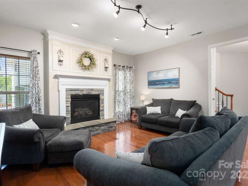 512 Veloce Trail, Fort Mill, SC 29715.  MLS# CAR4274741, YatesRealty ID 22407. Great room w/gas fireplace and hardwood floors
