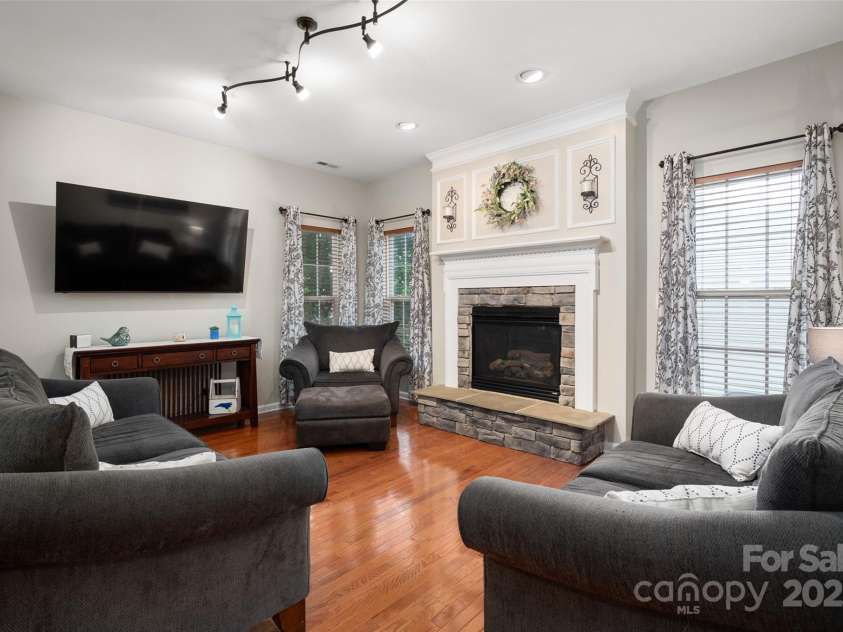 512 Veloce Trail, Fort Mill, SC 29715.  MLS# CAR4274741, YatesRealty ID 22407. Great room w/gas fireplace and hardwood floors