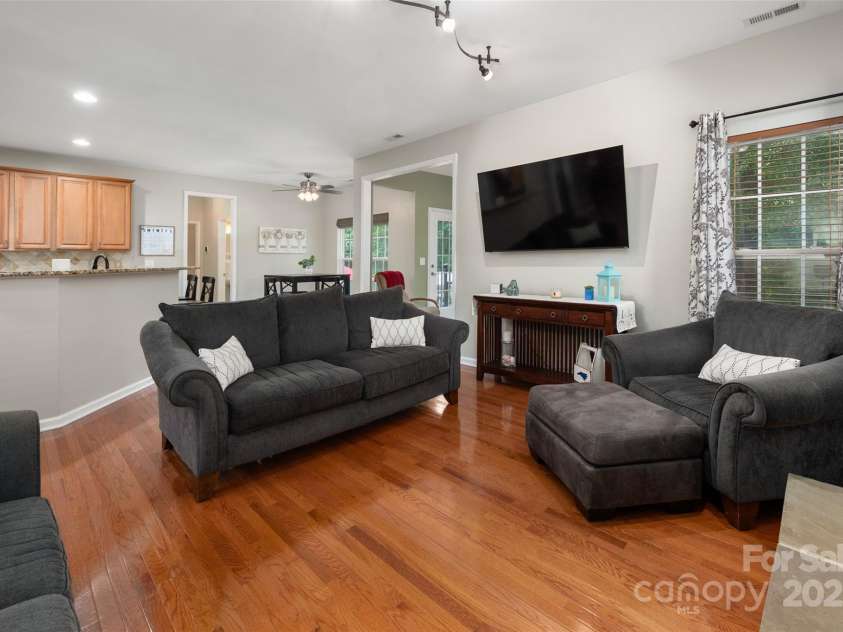 512 Veloce Trail, Fort Mill, SC 29715.  MLS# CAR4274741, YatesRealty ID 22407. Great room w/gas fireplace and hardwood floors
