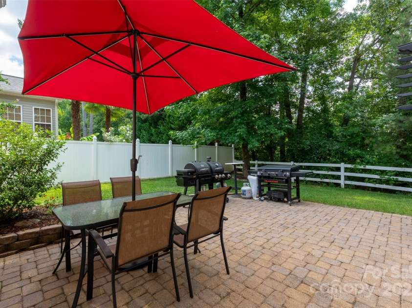 512 Veloce Trail, Fort Mill, SC 29715.  MLS# CAR4274741, YatesRealty ID 22407. Paver patio w/fully fenced private backyard